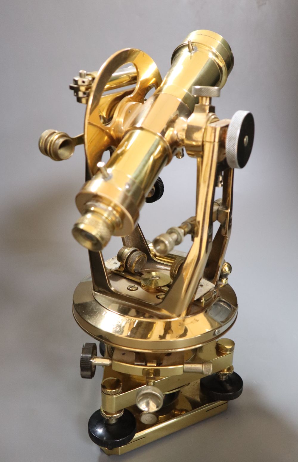 A brass theodolite, signed, Watts & Sons, London, height 32cm